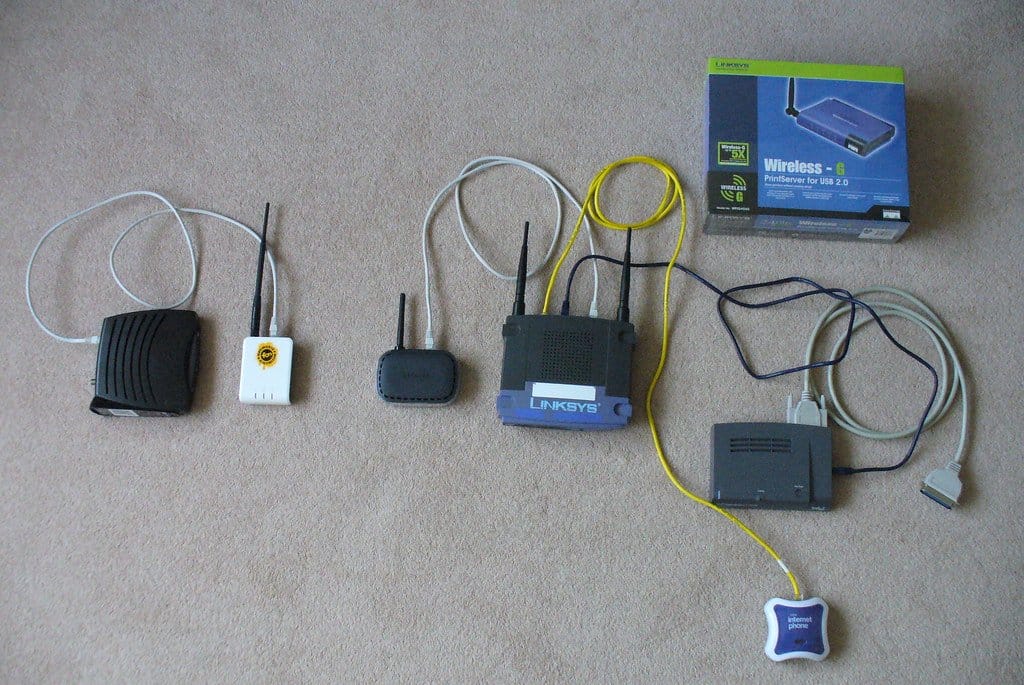 A home Wi-Fi router set up in a living room, the kind of real-home environment where placement affects coverage more than people expect